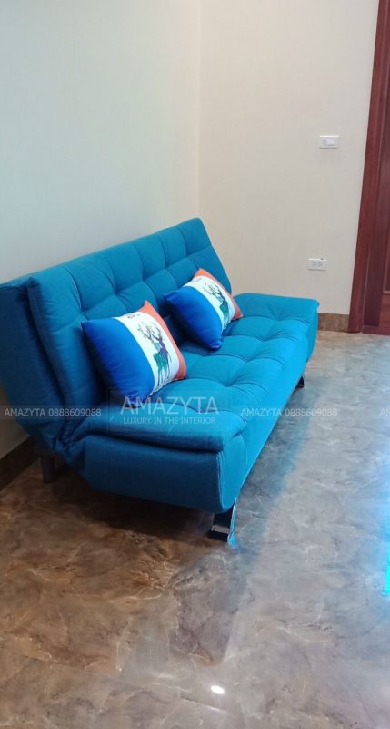 Sofa giường gam màu xanh không có tay phù hợp với không gian